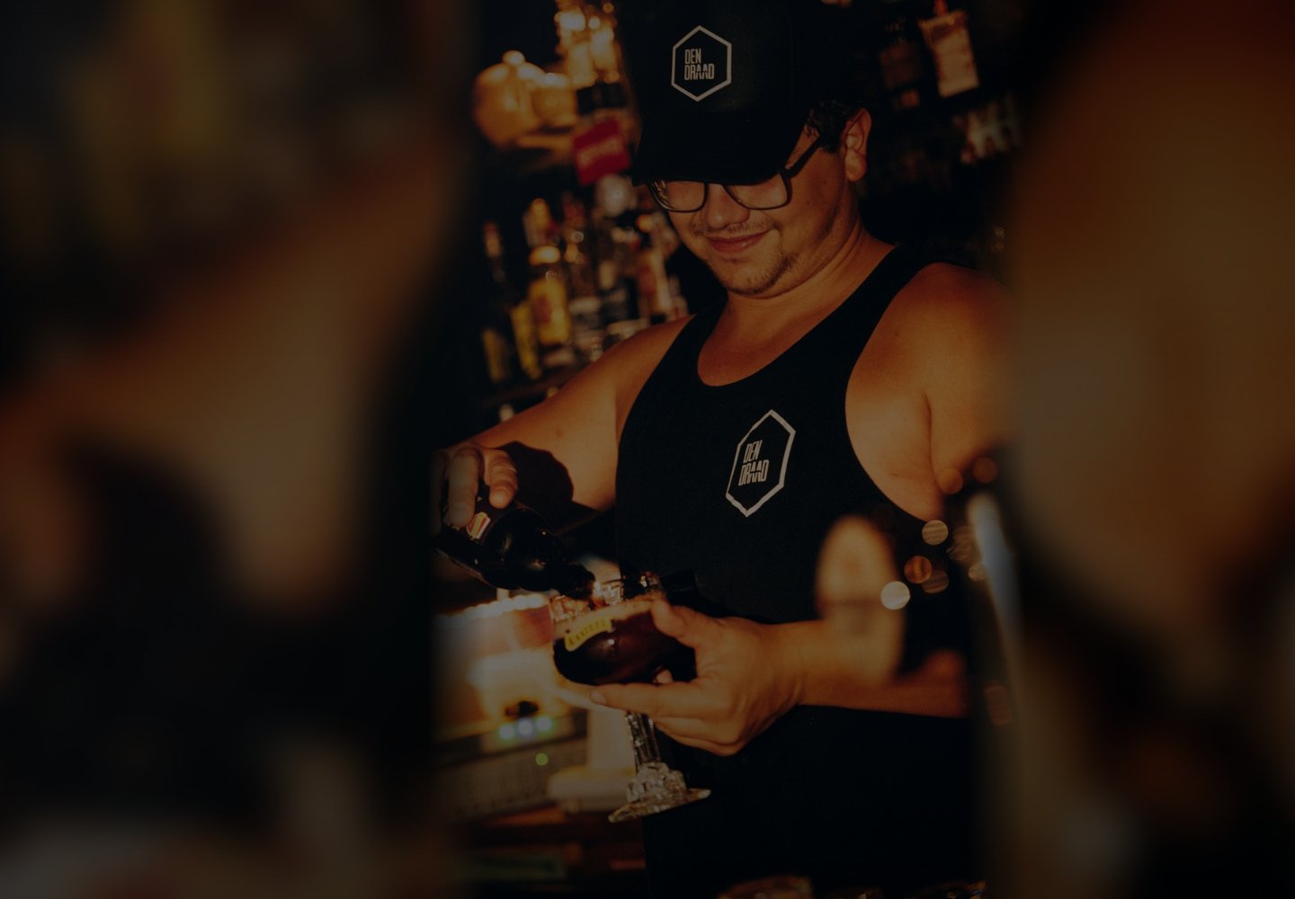 Screenshot van de website van Café Den Draad